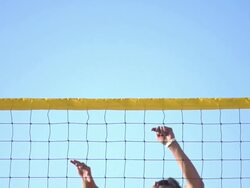 A man spiking a beach volleyball. - Slow Motion - filmed at 240 fps Stock Footage