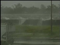Floodwaters from Hurricane Gustav can be seen going over the Industrial Canal levee in New Orleans' upper Ninth Ward. Instructional Video