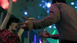 Young couple dance together on Fremont Street Stock Footage