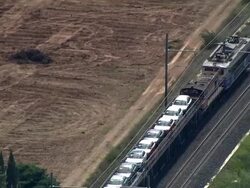 CS, TS, Freight train loaded with cars Rivesaltes, Languedoc-Roussillon, France Stock Footage