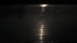 Moonlight  reflection on lake water Stock Footage