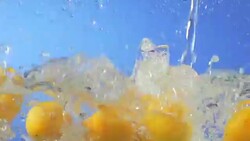 MONTAGE Fruit Splashing Into Water Stock Footage