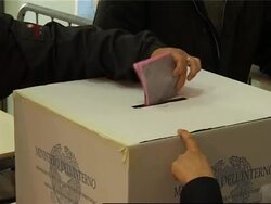 People voting in Italian election wear Free Tibet flags News Clip