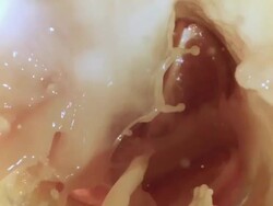 MS SLO MO Orange slice landing in orange juise / Los Angeles, CA, United States Stock Footage