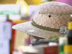 CU of woman sitting, obstructed view by various goods, La Cancha Market, Cochabamba, Bolivia Stock Footage