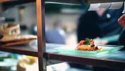 Chef finishing meals at a fine dining restaurant. Stock Footage