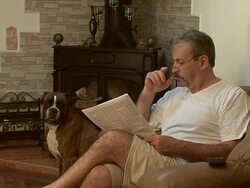 Reads the newspaper Stock Footage