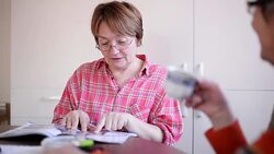 Woman reading magazine. Stock Footage