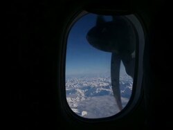 Mid shot of propeller and mountains Stock Footage