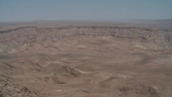 Rugged mesas and deep ravines characterize the Fish River Canyon in Namibia. Stock Footage