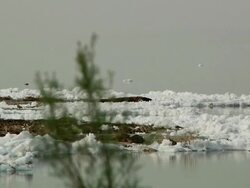 White block of foam on the water Stock Footage