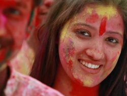 Portrait of a woman celebrating holi festival Stock Footage