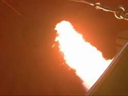 Hot air balloon being inflated, flame from below, Kenya, Africa Stock Footage