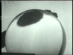 Magnifying glasses, microscopes and different materials used in scientific experiments. France, 1940s Stock Footage