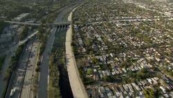 Aerial shot of Los Angeles River at the intersection of Los Feliz Boulevard and Interstate 5. Stock Footage