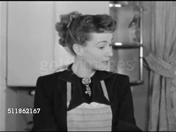 1948: CLAUDIA RADIO SHOW: DRAMATIZATION: Kathyrn Bard & Paul Crabtree ON SET kitchen, SOT 'David' (Paul Crabtree) & 'Claudia' (Kathyrn Bard) discussing the columns in check book. Instructional Video