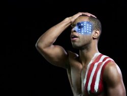 Disappointed man with US flag painted on face and shoulder Stock Footage