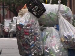 Man collecting tin cans, New York City, USA Stock Footage