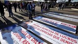 VOICED : Huelga de trabajadores de GM en Brasil News Clip