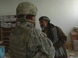 MS PAN Soldiers talking with civilians / Mausa Qala, Helmand Province, Afghanistan.  Stock Footage