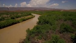 Fly low over Rio Grande River from Big Bend National Park Texas looking at Mexico 2 Stock Footage
