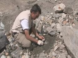 Male scientist taking glacier samples, Himalayas Stock Footage