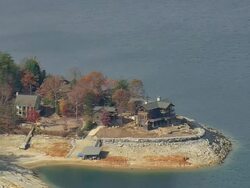 WS AERIAL View of house near jocasse dam and lake with wooded area / South Carolina, United States Stock Footage