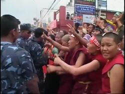 Tibetan protesters chain themselves together at Chinese Embassy's visa office News Clip