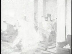 Reporters rush out of the Oval Office after President Harry S. Truman announces Japan's unconditional surrender to end World War II. News Clip