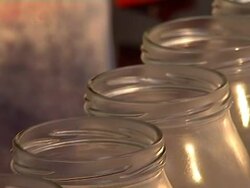 Glass jar on conveyor line Stock Footage