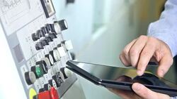 Hands of a man at control panel with digital tablet Stock Footage