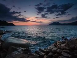 Rocky Coastline Sunset Stock Footage