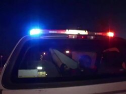 April 3 2009 MS POV Mexican Police officers in car as seen from behind, Juarez, Chihuahua, Mexico, AUDIO Stock Footage