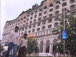 Brangelinas burly boduguard assaults photographer News Clip