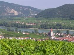 Weissenkirchen on Danube River in Austria PAN Stock Footage