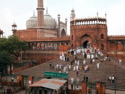 People leaving the Jama Masjid (Friday Mosque) after the Friday Prayers, Old Delhi, Delhi, India Stock Footage