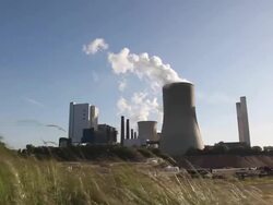 Power plant  on windy day Stock Footage