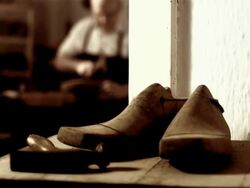 HD DOLLY: Traditional Shoemaker Workshop Stock Footage