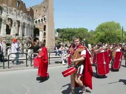 MS Shot of Costumes parade for anniversary of birth of Rome, also known as Natale di Roma, People dressed as ancient romans and gladiators walks along landmarks of city  AUDIO / Rome, Italy Stock Footage