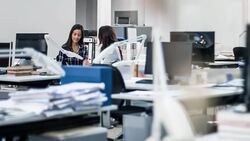 Two industrial designer women discussing project at office Stock Footage