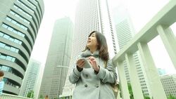 HD:Businesswoman talks with a mobile phone Stock Footage