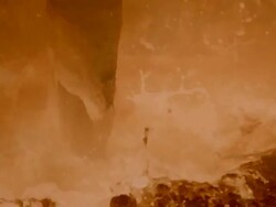 CU SLO MO PAN Shot of Pole sticking out from pool of molten steel Stock Footage