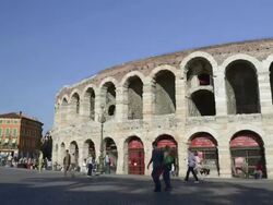 MS T/L Shot of Tourists roaming in front of Arena di Verona at Piazza Bra / Verona, Veneto, Italy Stock Footage