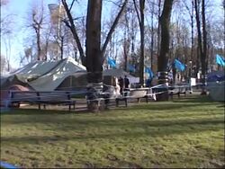 Yanukovych supporters at parliament sq, Yushchenko supporters setting up camp News Clip