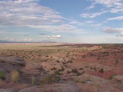 WS of Painted Desert with Fast Cars Stock Footage