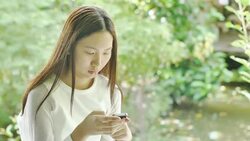 Teenage Girl Texting on a Mobile Phone Stock Footage