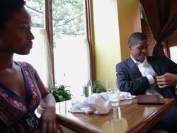 Young couple requesting bill in restaurant Stock Footage