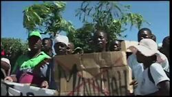 Protesters march on UN base they blame for epidemic News Clip