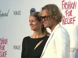 Karla Otto (L) and Peter Dundas at the Fashion For Relief Japan Stock Footage