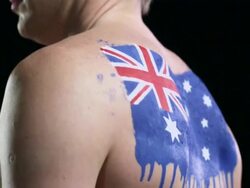 Man with Australian flag painted on back Stock Footage
